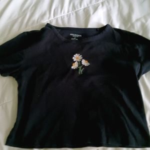 Black baby tee with daisies